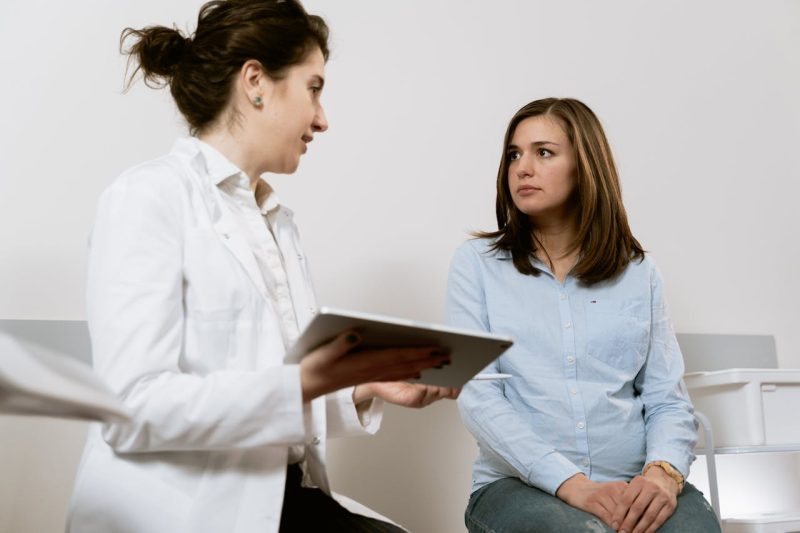 Doctor consulting patient in a Thrive direct primary care office.